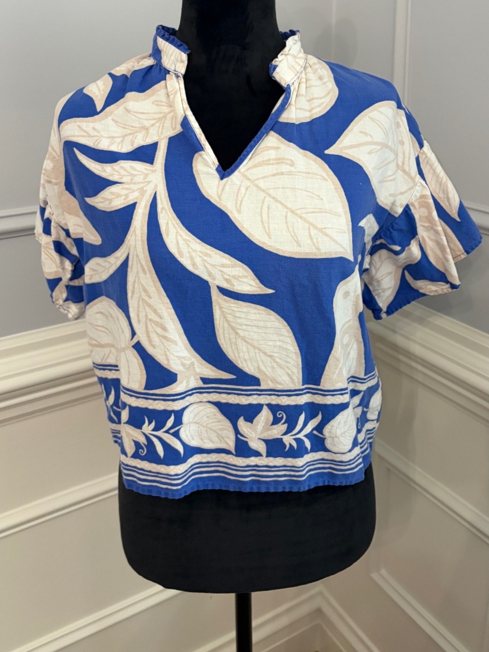 Rachel Zoe blouse size small. Blue, white and beige colors with leaf patterns.